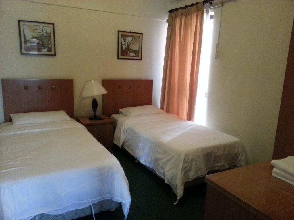 Dorcas Service Apartment - Marina Court Kota Kinabalu Bagian luar foto